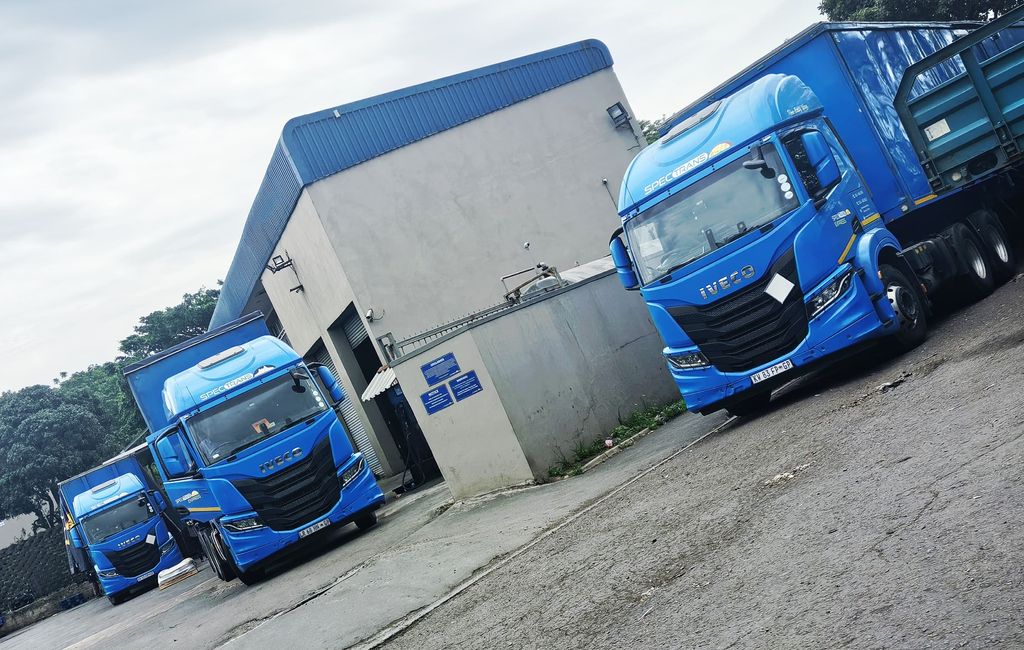 Spectrans trucks at the depot and operations office